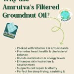 Amrutva Cold Pressed Groundnut Oil - A bottle of groundnut oil beside a bowl of peanuts.