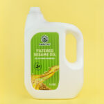 Filtered sesame oil pack of 5 liter with yellow background