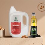Amrutva Cold Pressed Groundnut and Sesame Oil Combo. This image showcases a combo pack featuring cold pressed groundnut oil and black sesame seed oil; ideal for healthy cooking and other uses.