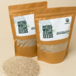 Amrutva premium white sesame seeds in a kraft bag; showcasing their natural quality. Ideal for adding a nutritious boost to meals or for making cold pressed sesame oil.