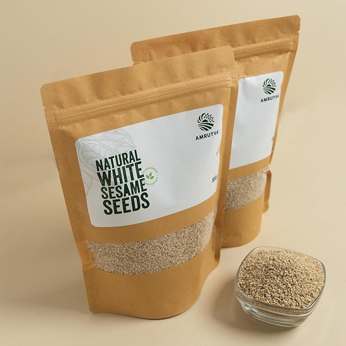 Amrutva premium white sesame seeds in a kraft bag; showcasing their natural quality. Ideal for adding a nutritious boost to meals or for making cold pressed sesame oil.