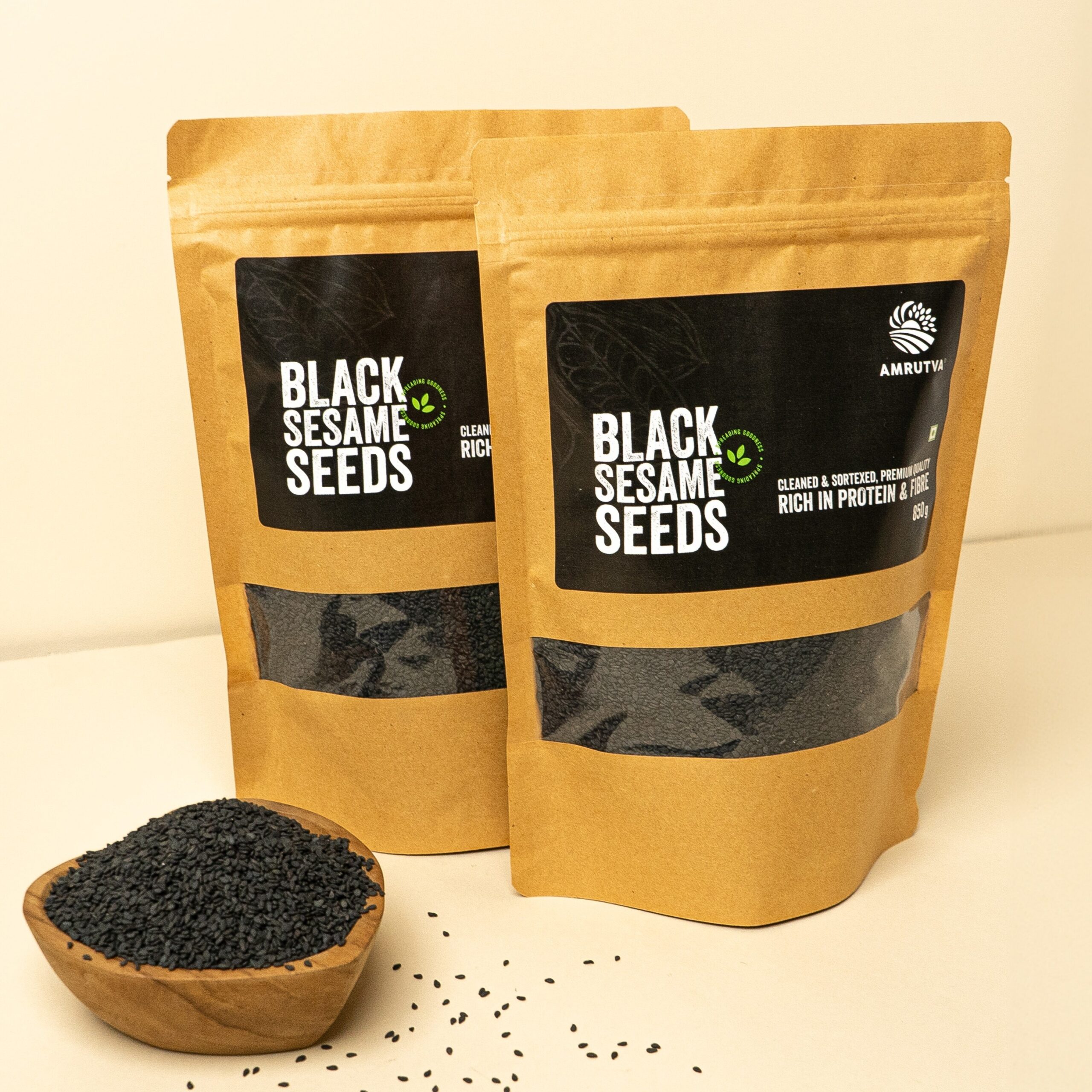 Premium quality natural black sesame seeds in a bowl and package.