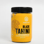 Amrutva Black Tahini made from roasted black sesame seeds. Perfect for dips; spreads; and more. Boost heart health with this excellent source of fiber.