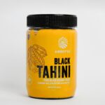 Amrutva Black Tahini made from roasted black sesame seeds. Perfect for dips; spreads; and more. Boost heart health with this excellent source of fiber.