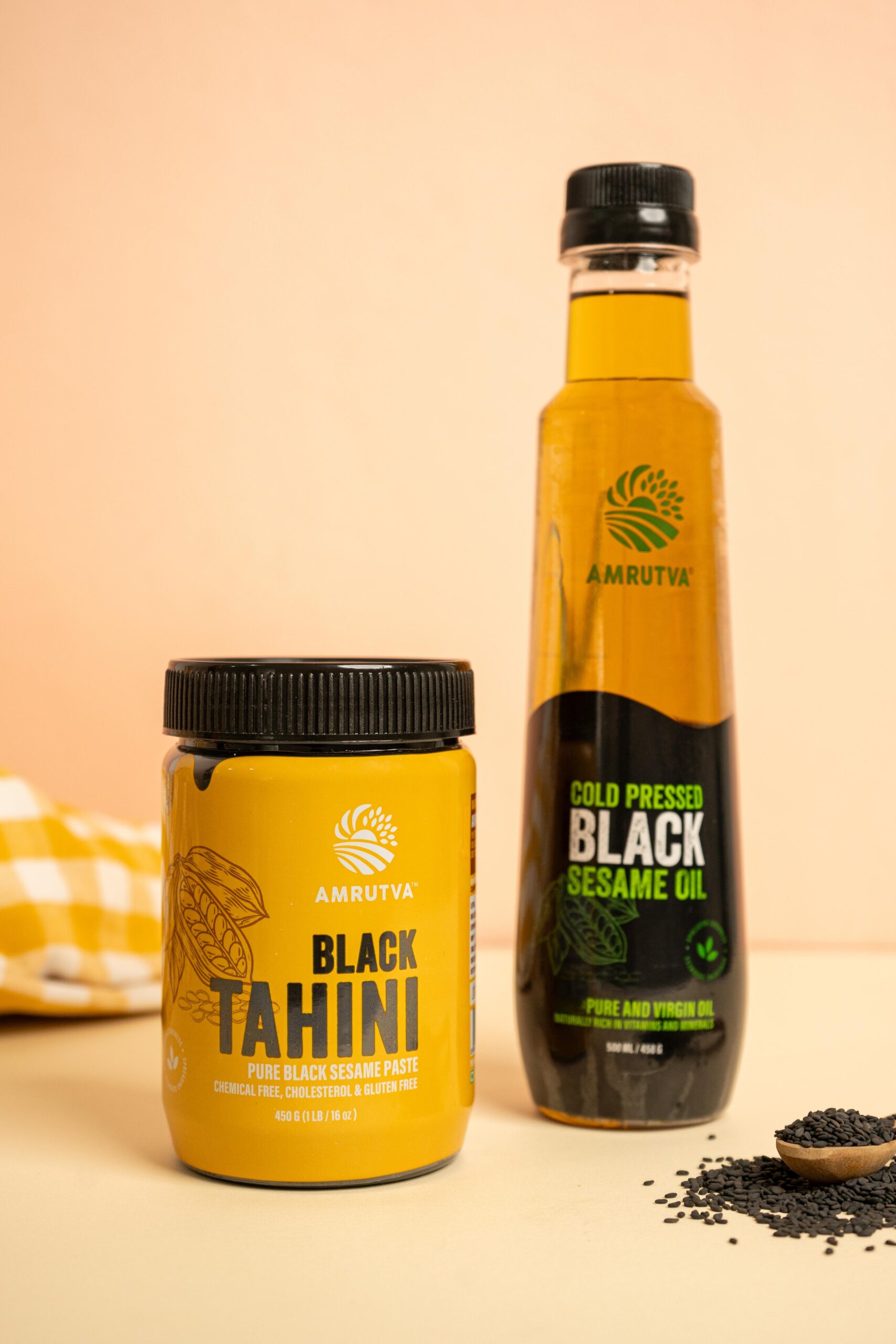 Amrutva Cold Pressed Black Sesame Oil and Black Tahini Combo. Perfect for cooking and adding a rich; nutty flavor to your dishes. This organic cold pressed sesame oil is a healthy and delicious choice.