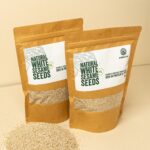 Premium quality natural white sesame seeds in a bowl and package.