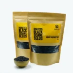 Roasted black sesame seeds in a bowl and package. These black sesame seeds are a good source of essential minerals and perfect for adding flavor to various dishes.