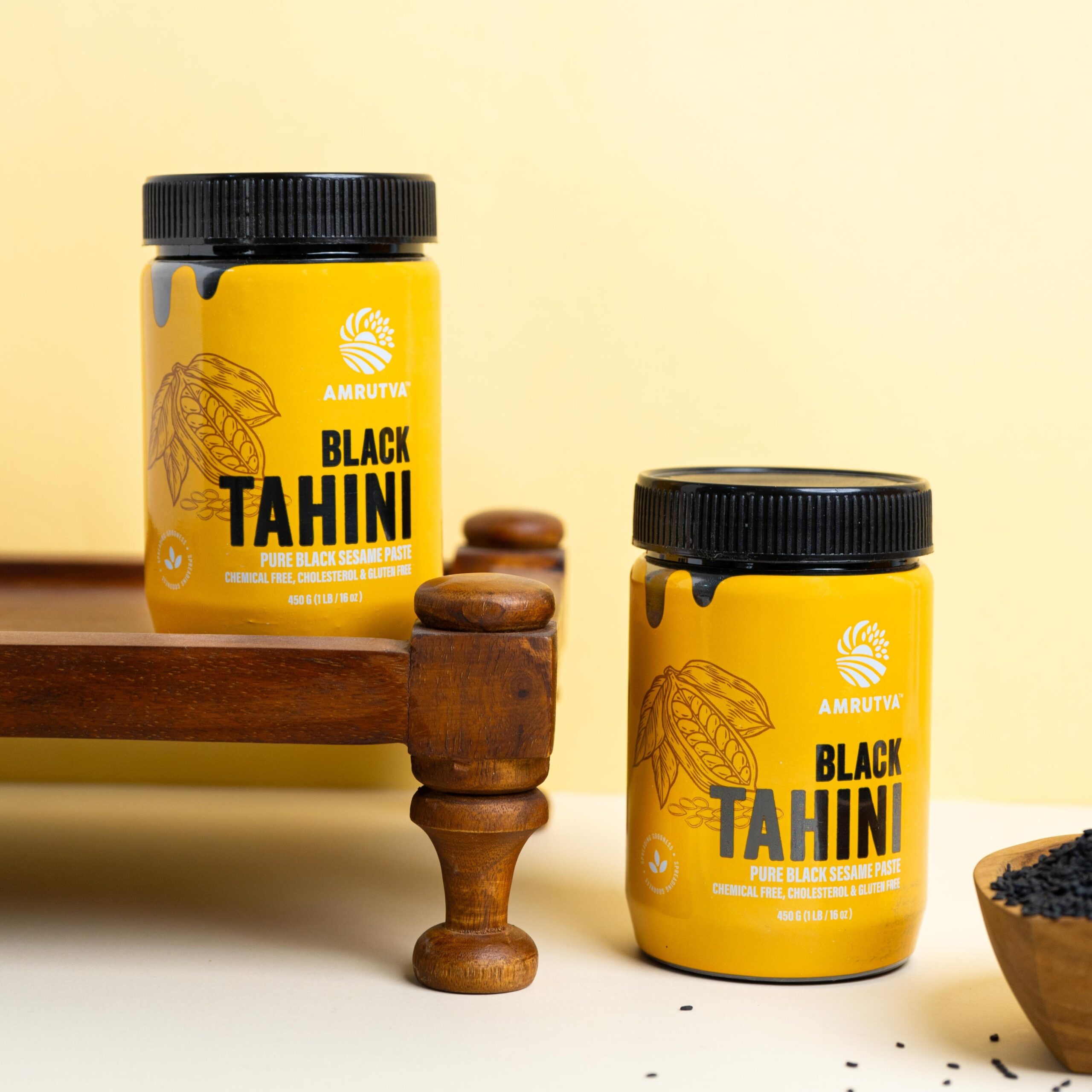 Amrutva Cold Pressed Black Sesame Oil and Black Tahini Combo. Perfect for cooking and adding a rich; nutty flavor to your dishes. This organic cold pressed sesame oil is a healthy and delicious choice.