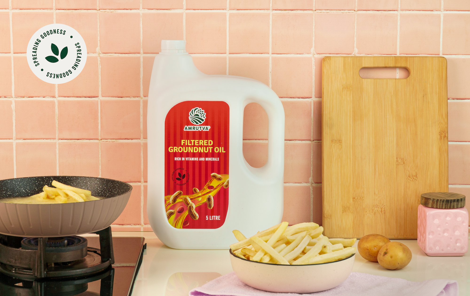 Filtered groundnut oil 5 L pack with kitchen setup